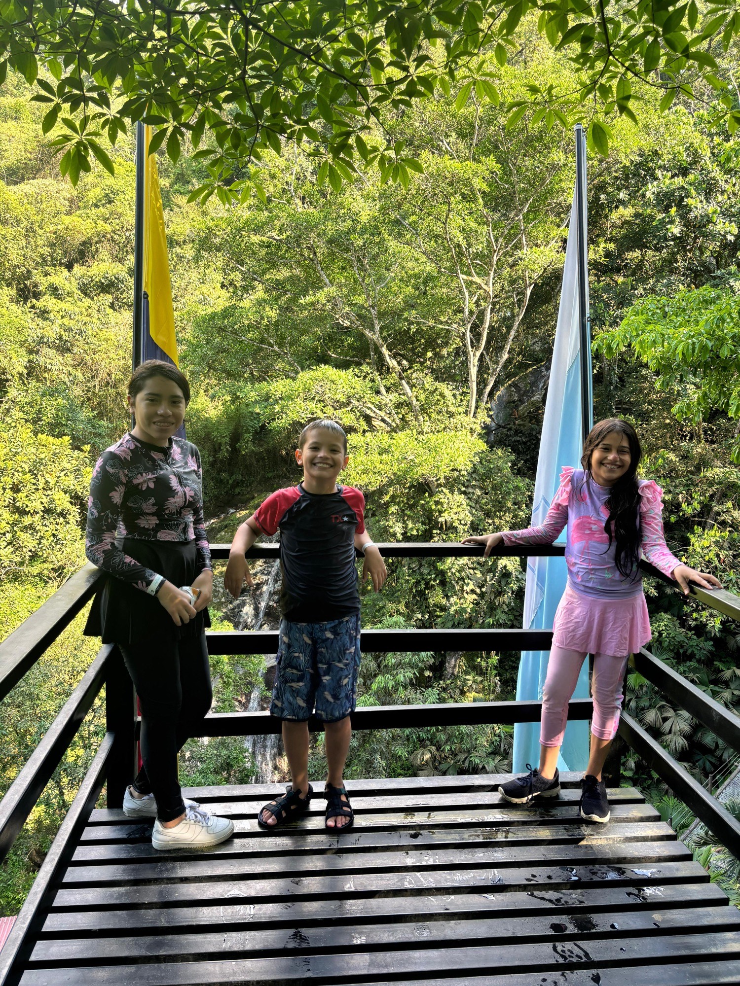 Kids enjoying an overlook in the jungle near Santa Marta